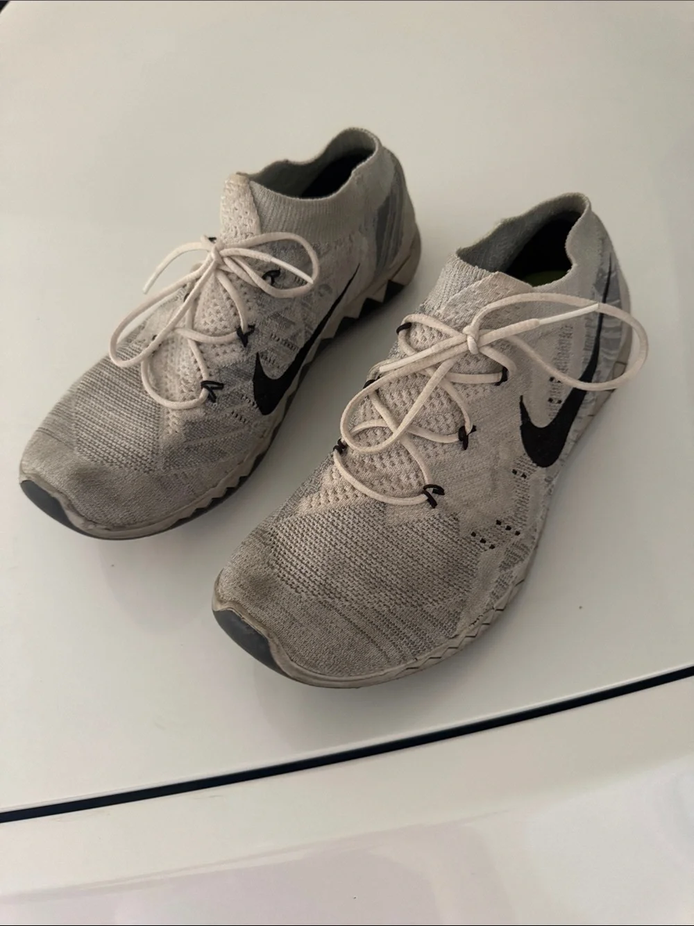 Nike Flyknit Sneakers in Light Gray with Black Swoosh - Picture 1 of 4